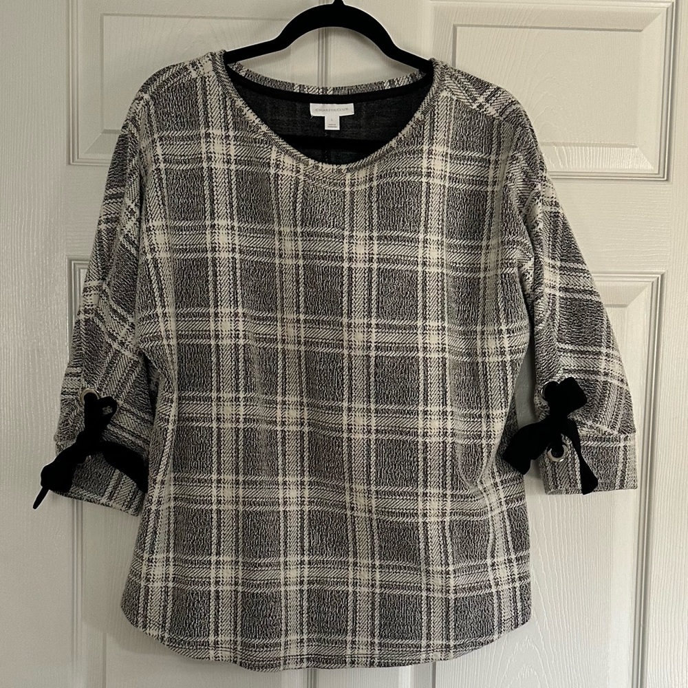 Black & white tunic top, scoop neck, 3/4 sleeves w/ black bows, silver grommets.